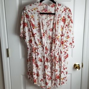 White top with red and yellow flowers